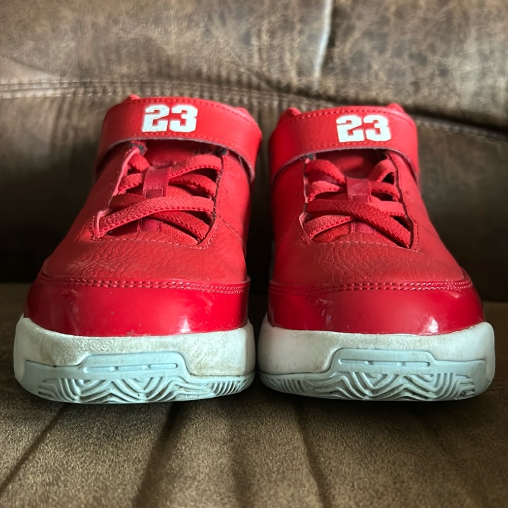 Red Jordan kids basketball sneakers. Excellent condition.